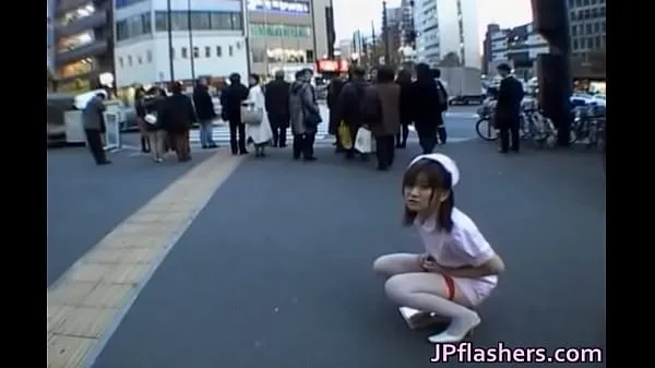 Tonton Naughty Asian girl is pissing in public drive Video